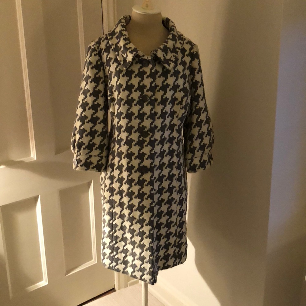 Three-quarter length houndstooth coat